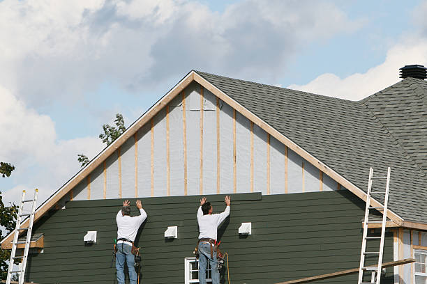 Professional Siding Replacement technician working in Niles, IL